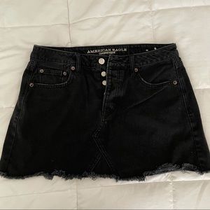Black denim mini skirt